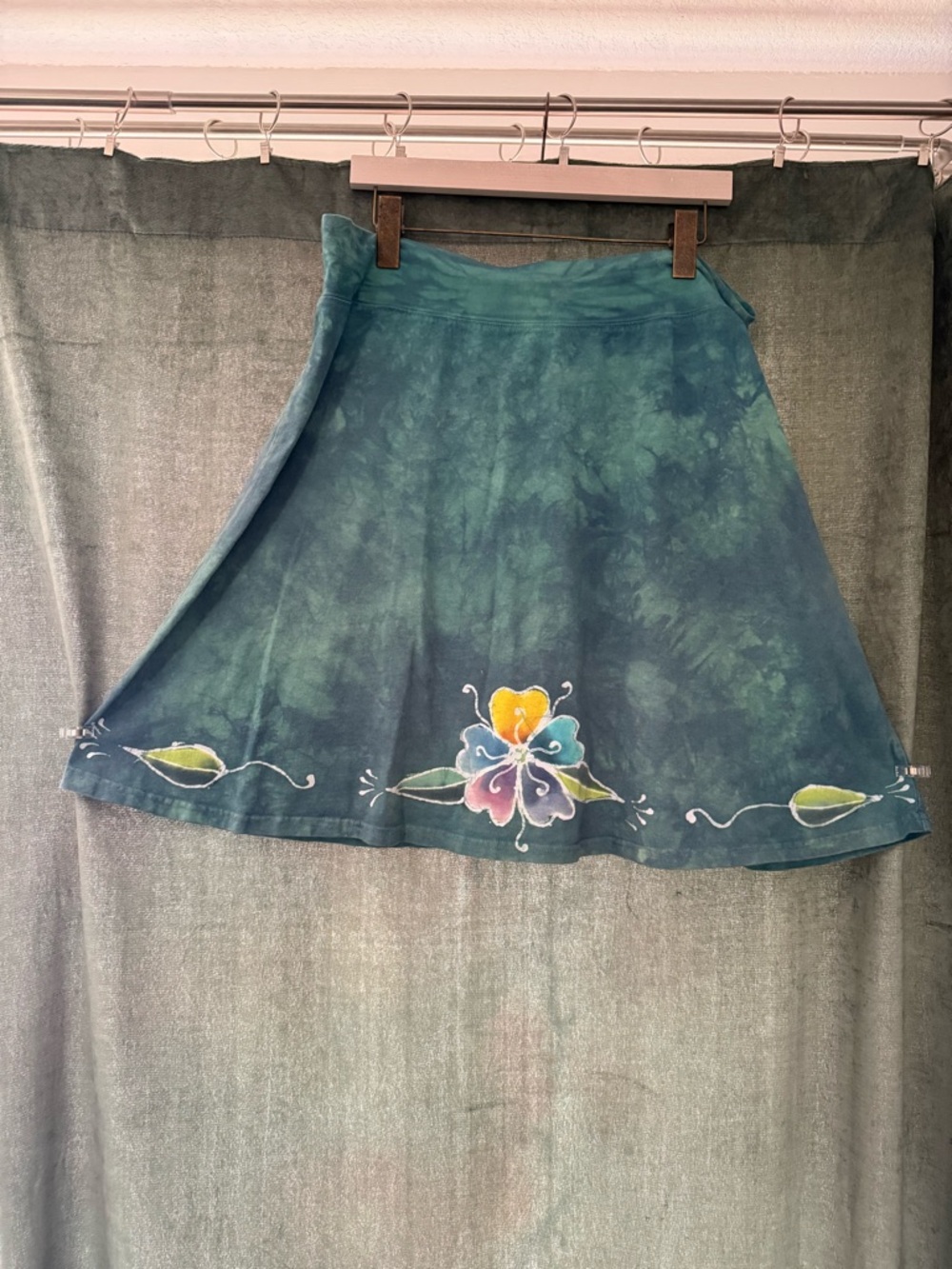 Teal A-Line Skirt with Floral Accent, designed by Boulder batik legend Nina Paul
